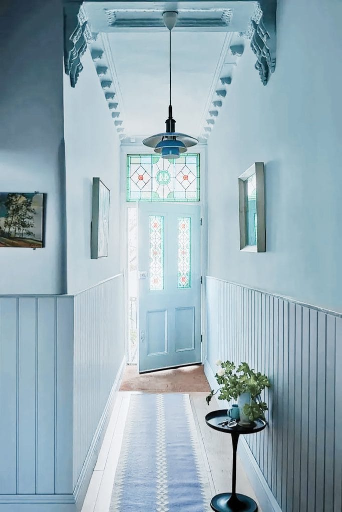 Pale blue hallway color drenching